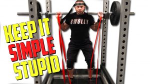 Squat with theraband and band on the neck. Keep it simple stupid.